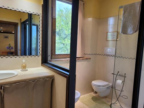 Koupelna v ubytování La Capanna di Poggio al Lupo