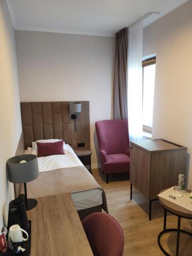 Letto o letti in una camera di Hotel Topaz Poznań Centrum
