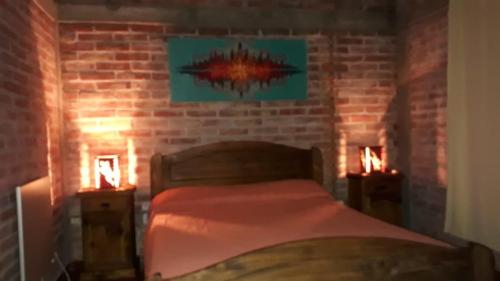 Giường trong phòng chung tại Quinta Santiago