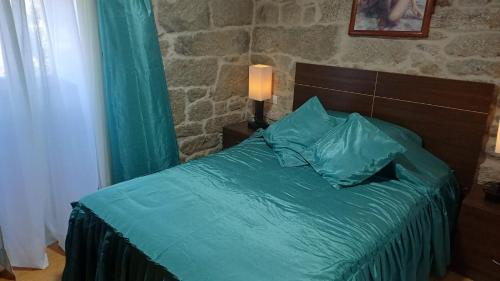 Ένα ή περισσότερα κρεβάτια σε δωμάτιο στο Casa Diaz