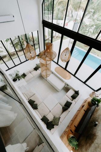 an overhead view of a living room with glass ceilings at abode II Zanzibar in Paje