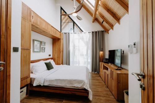Postel nebo postele na pokoji v ubytování abode II Zanzibar