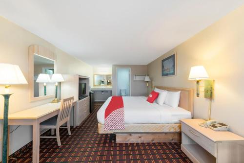 Ένα ή περισσότερα κρεβάτια σε δωμάτιο στο OYO Hotel Starlite Seneca Falls