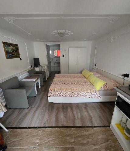 Ein Bett oder Betten in einem Zimmer der Unterkunft Bangó Vendégház