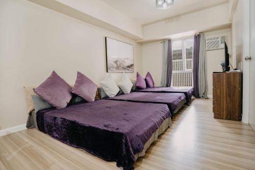 Postel nebo postele na pokoji v ubytování NEW! Trendy 1BR in Cebu IT Park- Central location