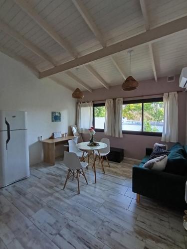 a living room with a couch and a table at 1991 Hospedaje D4 in Ensenada