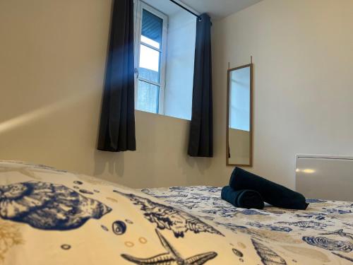 Posteľ alebo postele v izbe v ubytovaní Lourdes : Superbe T2 42m2