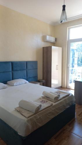 Katil atau katil-katil dalam bilik di Sea House Hotel