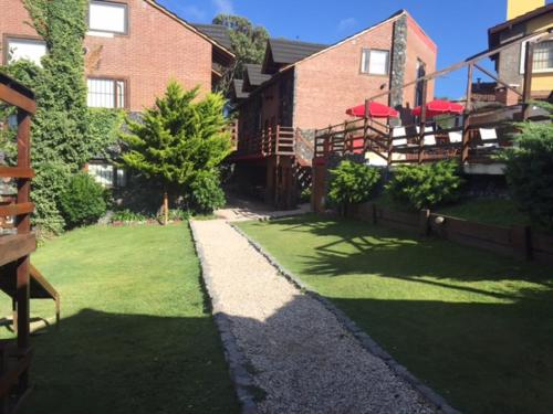Κήπος έξω από το Loma Escondida Apart Cabañas & Spa