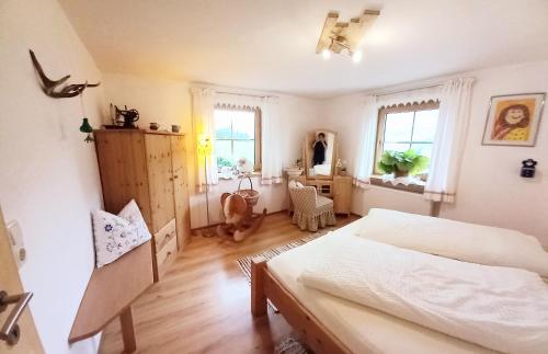 Postel nebo postele na pokoji v ubytování "Opa Sepp" - Gartenwohnung