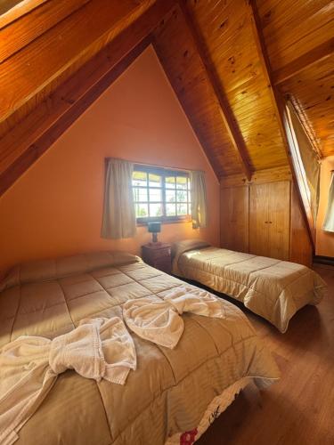 Postel nebo postele na pokoji v ubytování Náutico Apart Hotel