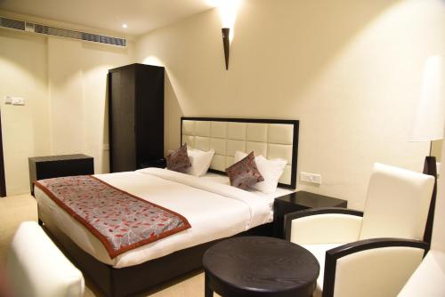 Postel nebo postele na pokoji v ubytování Viz Park Hotel