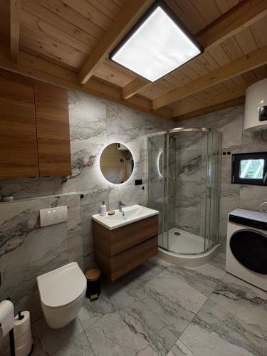 Koupelna v ubytování Domek letniskowy Zacisze 2