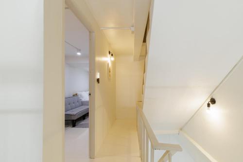 Ένα ή περισσότερα κρεβάτια σε δωμάτιο στο A Townhouse 100m from BTS Bangchak