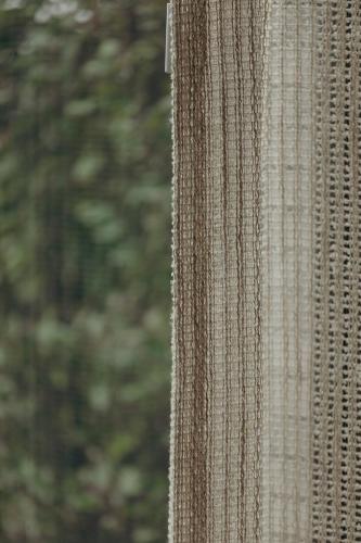 a close up of a curtain on a window at Au Porte Bonheur in Zwalm