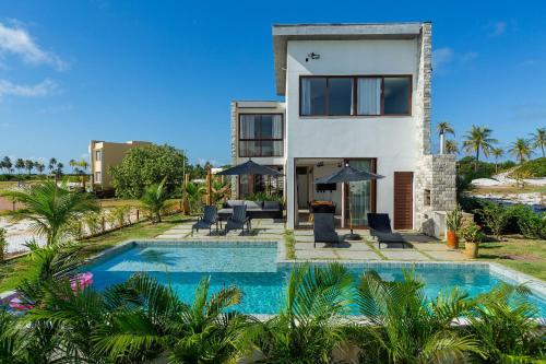 Bazén v ubytování Reserva Sauípe - Casa 224 nebo v jeho okolí