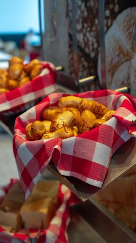 a bunch of pastries in a red and white wrapper at ibis Cartagena Marbella in Cartagena de Indias