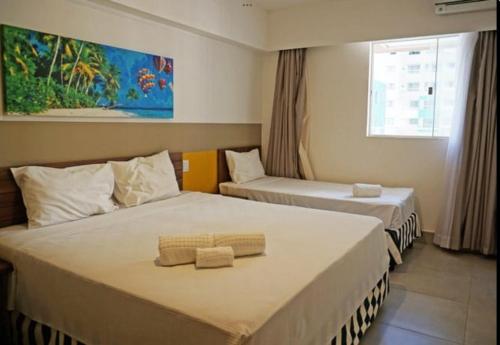 เตียงในห้องที่ Olímpia Park Resort - APTO 1 Quarto P/ 6 Pessoas
