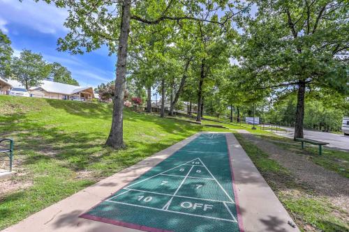 a golf course in a park with trees at Family Resort Condo with Perks in Branson! in Branson