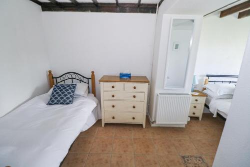 Ein Bett oder Betten in einem Zimmer der Unterkunft Dun na Ron