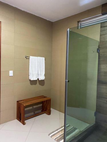 a bathroom with a shower and a glass shower stall at Hotel Boutique Blue Diamond in Tepatitlán de Morelos