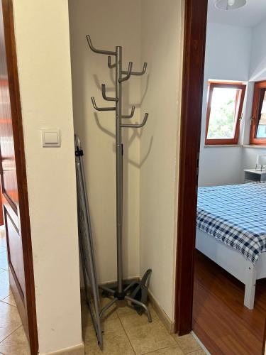 Ένα ή περισσότερα κρεβάτια σε δωμάτιο στο Apartments Aurora in Valbandon