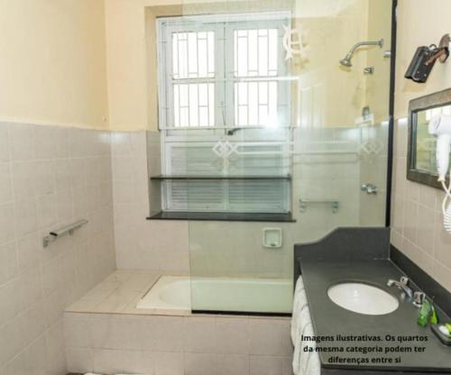 Koupelna v ubytování VOA Hotel Caxambu