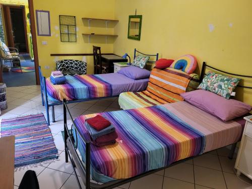 Bed-Letto-Cama in Shared Room Camera Condivisa