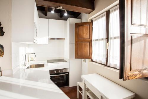 Køkken eller tekøkken på Apartamentos Turísticos Las Nieves