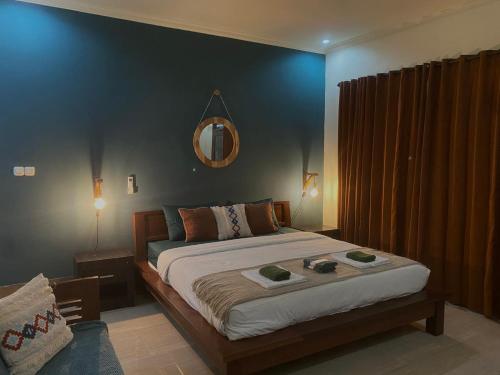 Postel nebo postele na pokoji v ubytování TT House Gili Air