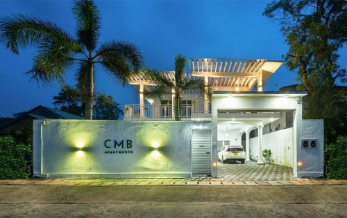 a house with a car parked in front of it at cmb apartments in Negombo