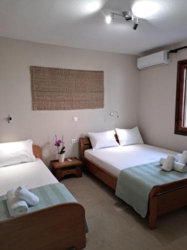 Postel nebo postele na pokoji v ubytování CASA Di TRE MARE