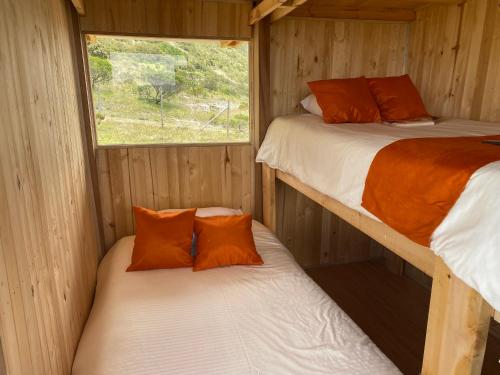 Hotel GranMount Cabañasにあるベッド