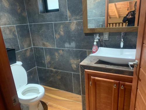 Koupelna v ubytování Cabaña EC