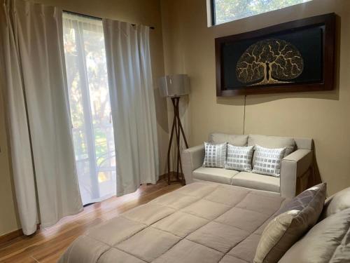 Postel nebo postele na pokoji v ubytování Cabaña EC