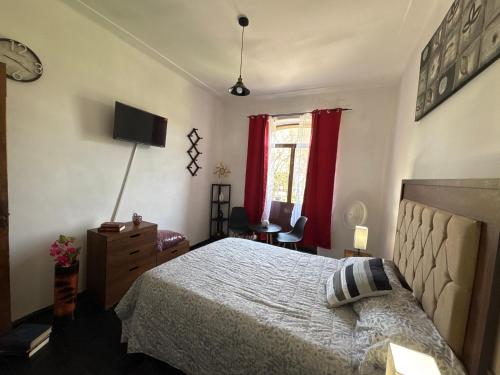Postel nebo postele na pokoji v ubytování TITOS HOME 2 suite