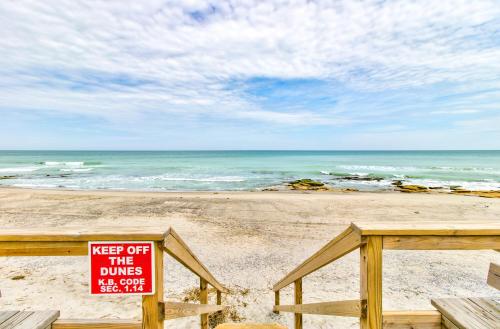 akeep off the dunes keep out sign on a beach at Ocean Dunes 2101A by Carolina Beach Realty in Kure Beach