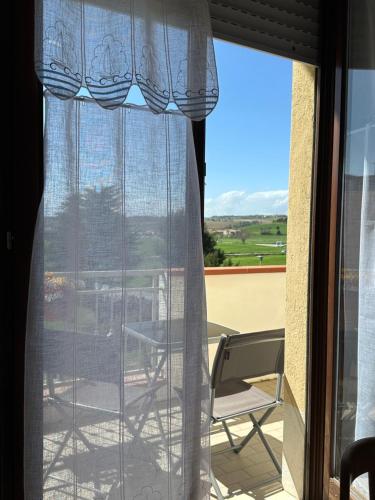 Un balcón o terraza de B&B SGUARDO AL CONERO