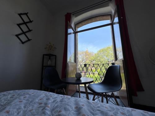 Postel nebo postele na pokoji v ubytování TITOS HOME 2 suite