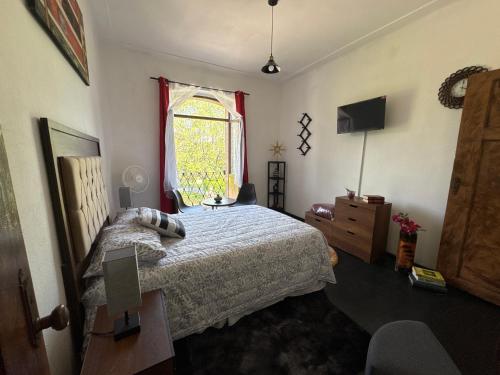 Postel nebo postele na pokoji v ubytování TITOS HOME 2 suite