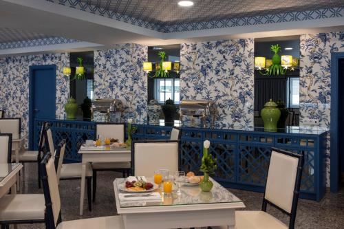 Coração de Fatima Boutique Hotel tesisinde bir restoran veya yemek mekanı