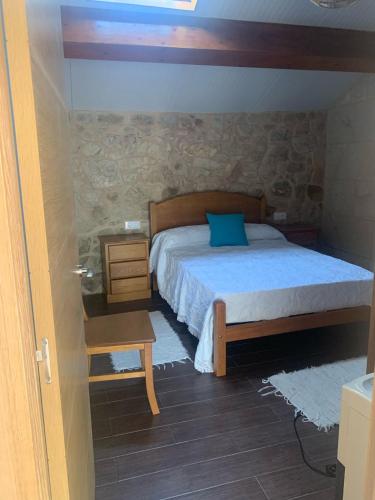 Ένα ή περισσότερα κρεβάτια σε δωμάτιο στο O Pazo, lugar con encanto!