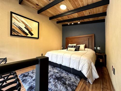 Postel nebo postele na pokoji v ubytování Cabaña del bosque 2