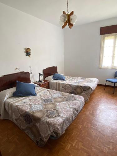 Ένα ή περισσότερα κρεβάτια σε δωμάτιο στο Casa la Viña