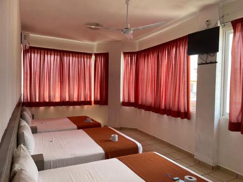 Katil atau katil-katil dalam bilik di Hotel Albatros