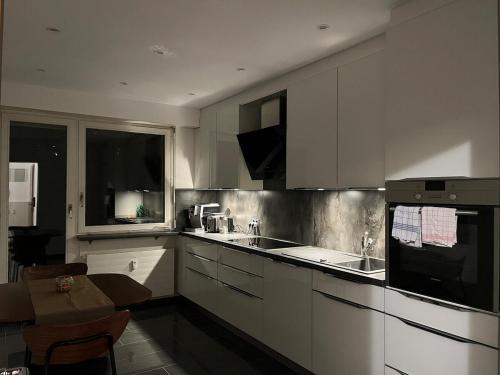 Η κουζίνα ή μικρή κουζίνα στο Cozy Central Apartment