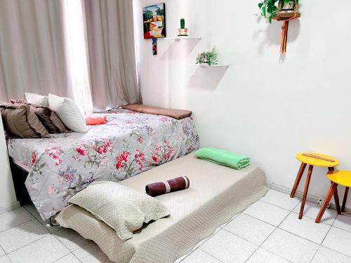 Ένα ή περισσότερα κρεβάτια σε δωμάτιο στο Studio no Flamengo - RJ