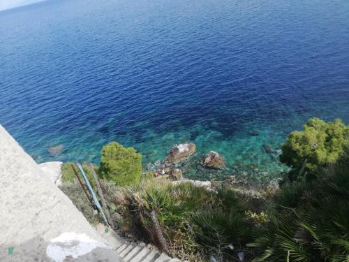 an aerial view of the ocean and the water at Case Nereidi 2 in Porticello