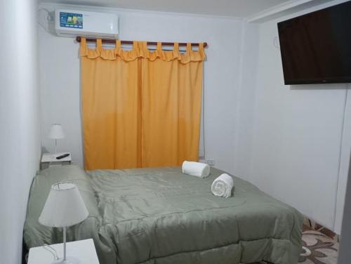 Postel nebo postele na pokoji v ubytování Departamento federación 1