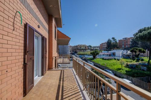 a balcony of a building with a view of a street at Magnolia House in Fonte Nuova